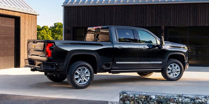 Black 2024 Chevy Silverado HD parked in driveway