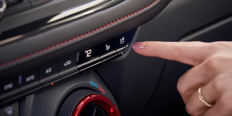 A Driver is operating a different functionality button