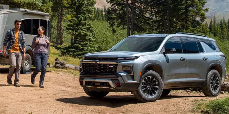 Amen and women waking towards Traverse